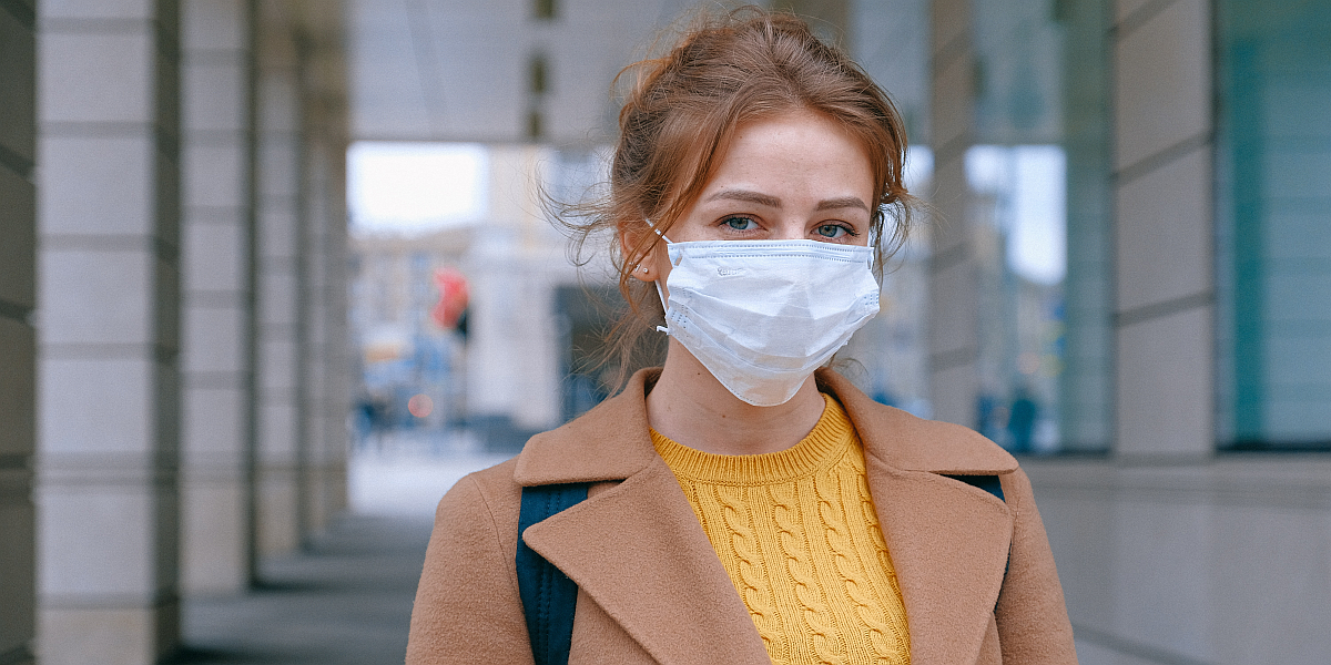 woman wearing a dust mask