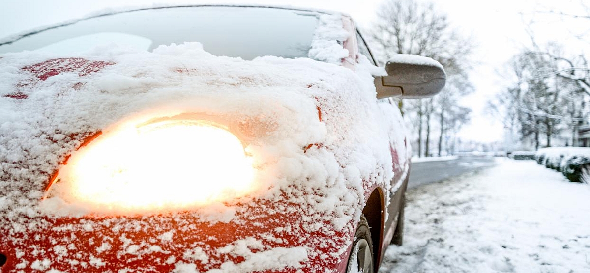 Icy car on a street